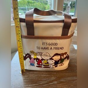 New Peanuts Snoopy Cream and Brown Lunch Bag Tote
It’s Good to Have a Friend